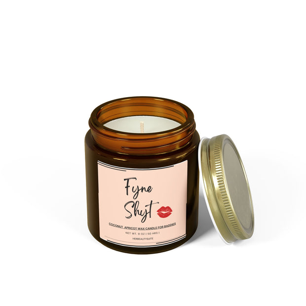 9oz amber glass "Fyne Shyt" self-love candle with a pink label, red lips, and gold lid.