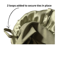 Close-up of a sage green mulberry silk bonnet with two loops to secure ties.