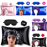 Satin Beauty Sleep sets with bonnets, pillowcases, eye masks, and scrunchies in pink, blue, black, and purple.